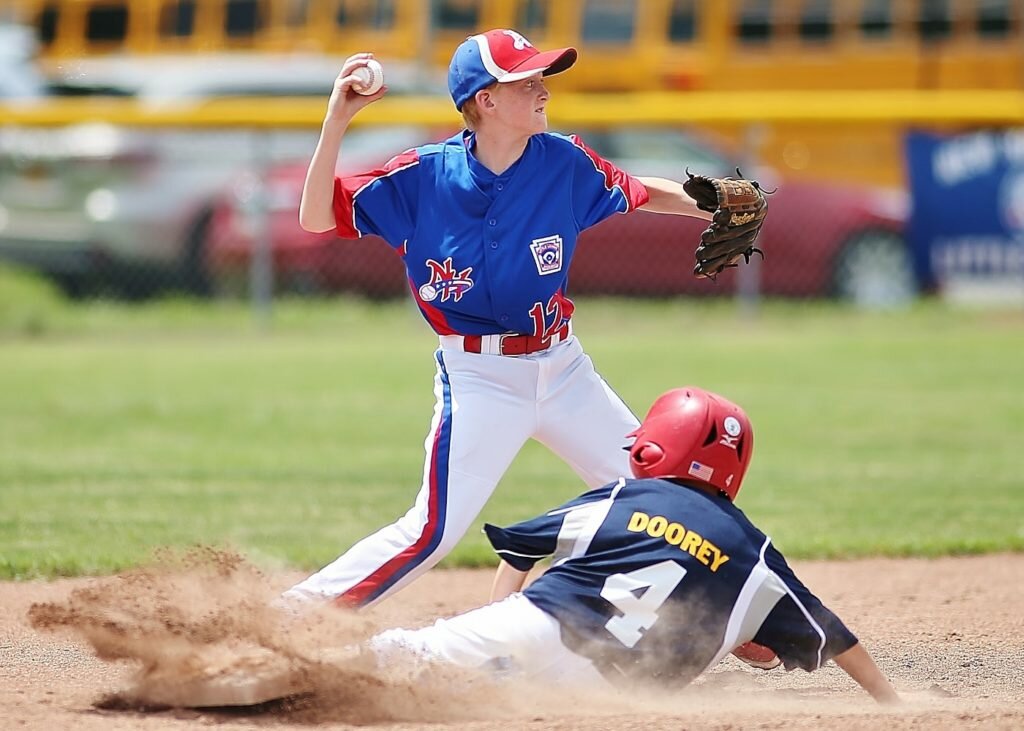 Plattsburgh's Brady Doory (4) is out at 2nd base as New Hartford's Jack Darby looks to turn two (Photo by Jeff Pexton - Perfect Game Imaging)