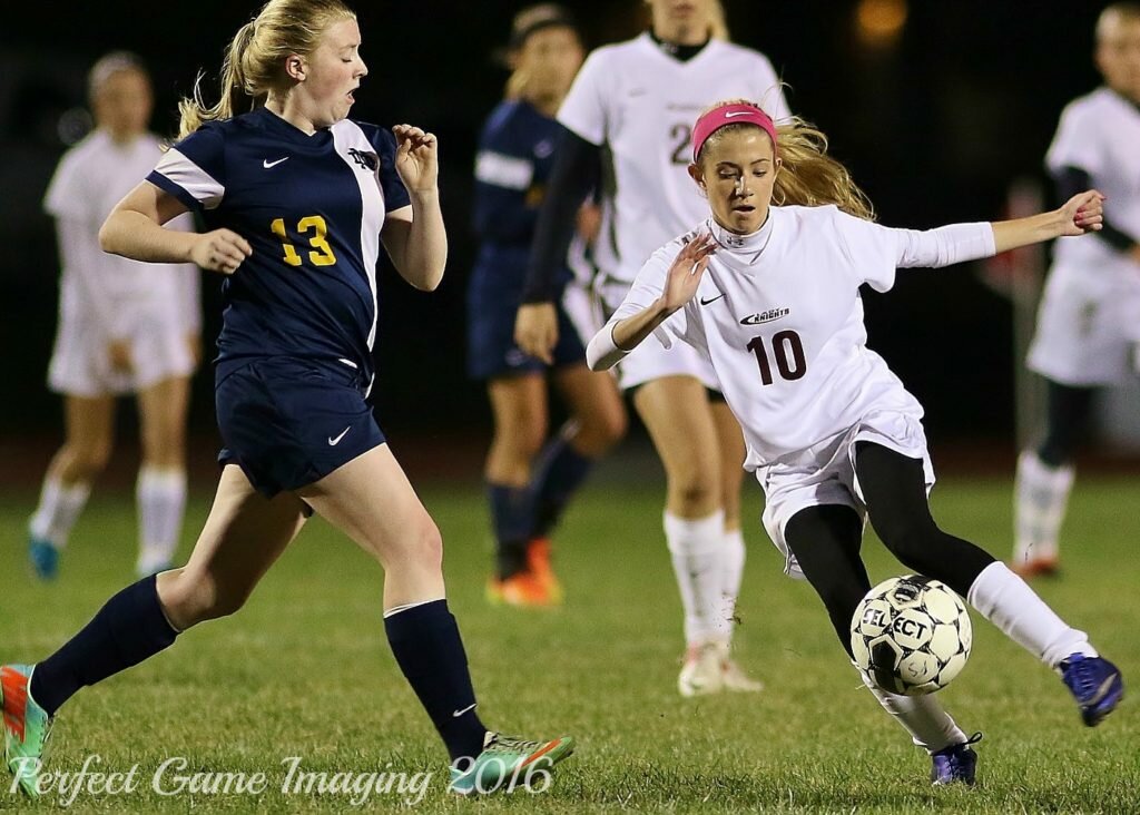 Frankfort's Courtney Madia (10) settles a ball in front of the ND goal, as Jugglers defender Sophie Whittenbeck (13) looks to break up the play. Madia had two goals in Frankfort's 6-2 win. (Photo by - Jeff Pexton - Perfect Game Imaging).