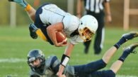 CVA's Josh Klosner (3) leaps over Notre Dame's Zach Brush (7) for a Thunder first down. (Photo By - Jeff Pexton - Perfect Game Imaging).